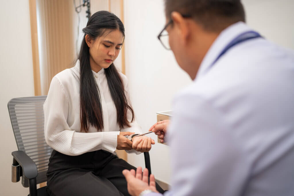 Mature Male Doctor Explain To The Woman Patient The Result Of X