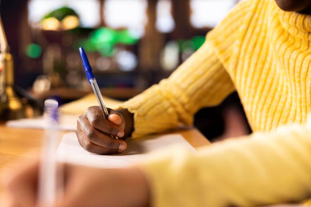 Young Scholars Focusing On Writing An Essay In A Q 2025 02 20 08 07 40 Utc