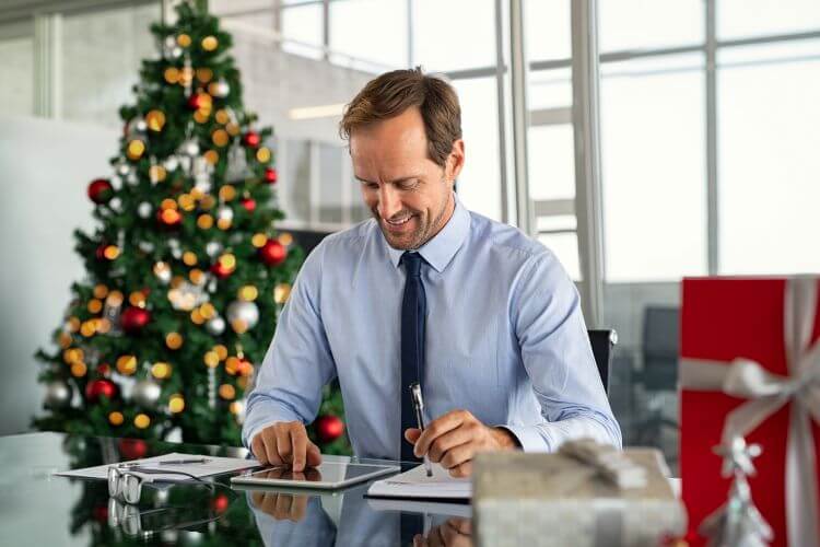 Businessman Working On Digital Tablet At Christmas 2025 01 08 09 02 44 Utc