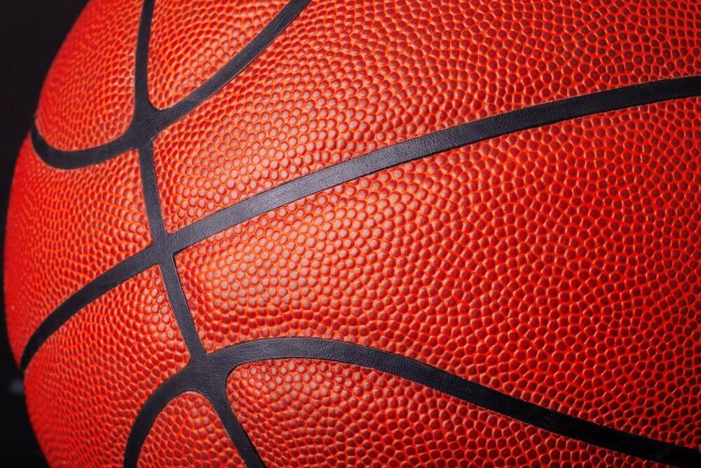 Close Up Of An Orange Basketball On A Black Backgr 2026 03 05 11 37 04 Utc