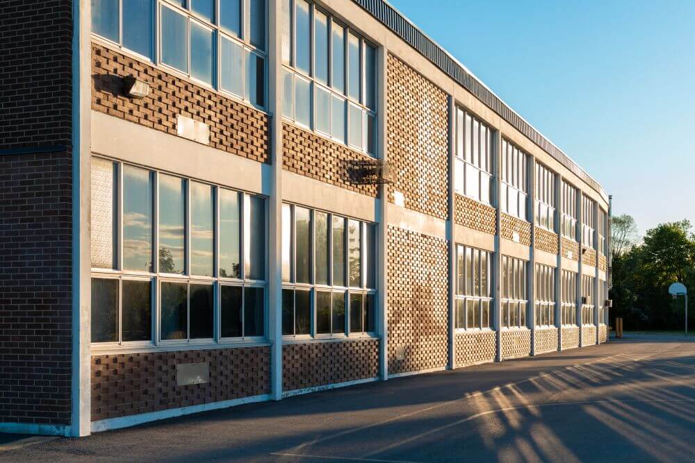 School Building And Schoolyard In The Evening 2026 03 09 01 50 05 Utc