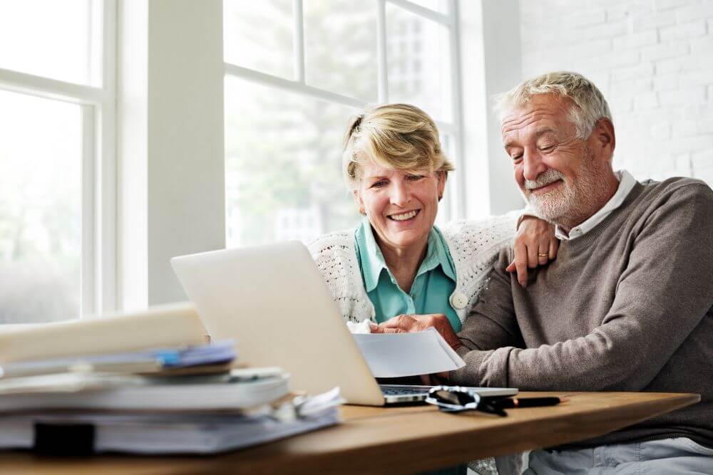 Senior Couple Enjoys Computer At Home Together 2026 01 07 23 26 04 Utc